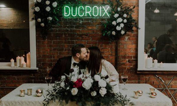 led neon sign reads &quot;you and me&quot; for weddings