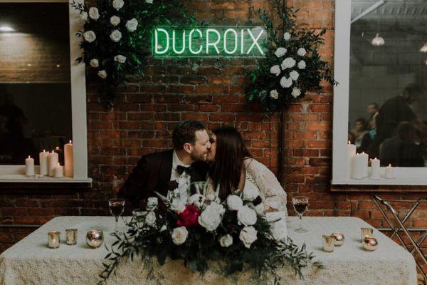 led neon sign reads "you and me" for weddings